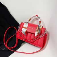 Women's Medium Pu Leather Solid Color Fashion Ribbon Square Magnetic Buckle Crossbody Bag main image 1