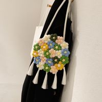 Women's Medium Cotton And Linen Flower Cute Tassel Round Magnetic Buckle Crossbody Bag main image 6