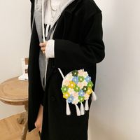 Women's Medium Cotton And Linen Flower Cute Tassel Round Magnetic Buckle Crossbody Bag main image 3
