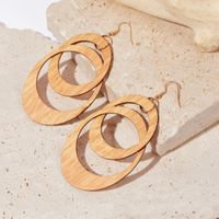 Simple Style Circle Wood Hollow Out Women's Ear Hook 1 Pair main image 4