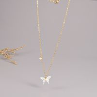 Einfacher Stil Schmetterling Titan Stahl Vergoldet Künstliche Perlen Hülse Halskette Mit Anhänger main image 5
