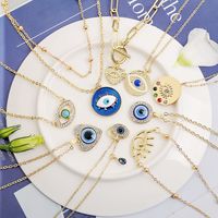 Fashion Devil's Eye Heart Shape Alloy Plating Artificial Rhinestones Women's Pendant Necklace main image 1