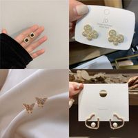 Fashion Bow Knot Alloy Plating Inlay Artificial Gemstones Women's Ear Studs 1 Pair main image 5
