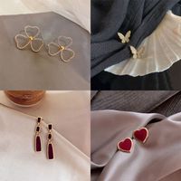 Fashion Bow Knot Alloy Plating Inlay Artificial Gemstones Women's Ear Studs 1 Pair main image 4