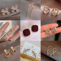 Fashion Bow Knot Alloy Plating Inlay Artificial Gemstones Women's Ear Studs 1 Pair main image 1
