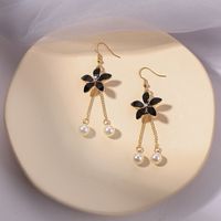 Estilo Simple Flor Aleación Embutido Circón Mujeres Pendientes De Gota 1 Par sku image 11