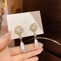 Mode Fleur Noeud D'arc Le Cuivre Incruster Perles Artificielles Zircon Boucles D'oreilles 1 Paire sku image 8