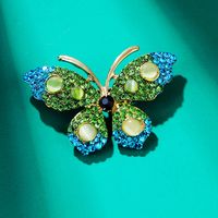 Moda Mariposa Aleación Enchapado Embutido Diamantes De Imitación Mujeres Broches main image 3