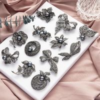 Retro Flower Bow Knot Alloy Plating Inlay Rhinestones Pearl Women's Brooches main image 1