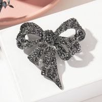 Rétro Fleur Noeud D'arc Alliage Placage Incruster Strass Perle Femmes Broches sku image 1