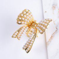Women's Fashion Letter Bow Knot Alloy Plating Inlay Artificial Pearls Artificial Diamond Hair Claws sku image 1