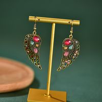 1 Pair Retro Wings Metal Inlay Artificial Gemstones Women's Ear Hook main image 1