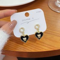 1 Pair Sweet Bow Knot Imitation Pearl Alloy Spray Paint Plating Women's Drop Earrings sku image 1