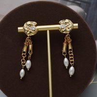 1 Par Estilo Vintage Estilo Francés Irregular Borla Borla Perla Embutido Cobre Circón Chapados en oro de 18k Pendientes De Gota main image 5