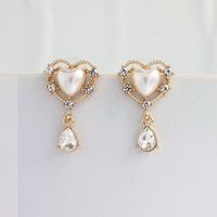 1 Pair Simple Style Heart Shape Alloy Inlay Artificial Pearls Zircon Women's Drop Earrings main image 3