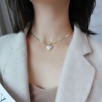 Korean Style Heart Shape Artificial Pearl Titanium Steel Inlaid Gold Pendant Necklace 1 Piece main image 4