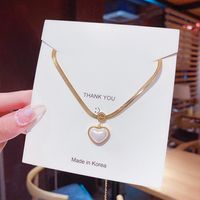 Korean Style Heart Shape Artificial Pearl Titanium Steel Inlaid Gold Pendant Necklace 1 Piece main image 3