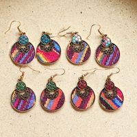 1 Pair Ethnic Style Round Cloth Metal Plating Inlay Artificial Gemstones Women's Drop Earrings main image 2