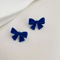 1 Pair Fashion Butterfly Bow Knot Flocking Plating Women's Ear Studs main image 2