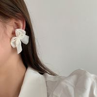 1 Pair Fashion Bow Knot Cloth Pearl Women's Ear Studs main image 2