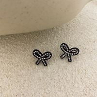 1 Pair Fashion Bow Knot Plastic Resin Inlay Artificial Diamond Women's Ear Studs sku image 1