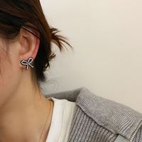 1 Pair Fashion Bow Knot Plastic Resin Inlay Artificial Diamond Women's Ear Studs main image 3