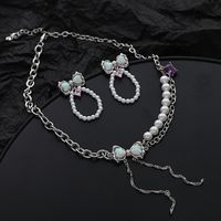 Mode Bogenknoten Kupfer Perle Überzug Inlay Künstliche Edelsteine Tropfenohrringe 1 Paar main image 4