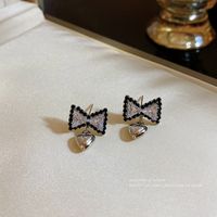 Ins Style Heart Shape Bow Knot Copper Inlay Zircon Drop Earrings 1 Pair main image 4