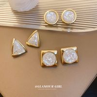 1 Pair Retro Triangle Alloy Inlay Resin Women's Ear Studs main image 1