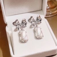 1 Pair Sweet Bow Knot Alloy Plating Shell Women's Drop Earrings main image 1