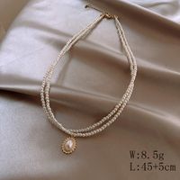 1 Jeu Élégant Géométrique Alliage Perlé Perles Artificielles Femmes Collier En Couches main image 3
