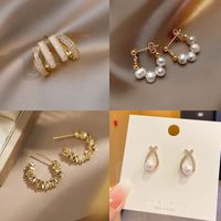 Fashion Heart Shape Butterfly Bow Knot Copper Inlay Artificial Pearls Shell Zircon Earrings 1 Pair main image 4