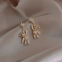 Fashion Heart Shape Butterfly Bow Knot Copper Inlay Artificial Pearls Shell Zircon Earrings 1 Pair main image 3