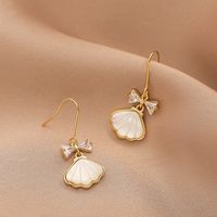 Moda Forma De Corazón Mariposa Nudo De Lazo Cobre Embutido Perlas Artificiales Cascarón Circón Aretes 1 Par sku image 27