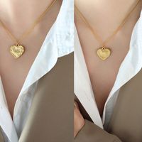 Retro Imitation Baroque Embossed Peach Heart Irregular Pendant Titanium Steel Necklace sku image 1