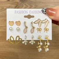 6 Paires Mode Forme De Cœur Fleur Papillon Perle D'imitation Alliage Placage Incruster Cristal Artificiel Femmes Boucles D'oreilles Boucles D'oreilles main image 2