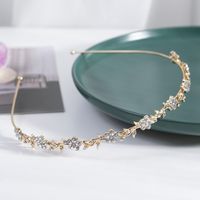 Women's Simple Style Waves Flower Bow Knot Metal Inlay Pearl Zircon Hair Band sku image 20