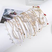 Women's Simple Style Waves Flower Bow Knot Metal Inlay Pearl Zircon Hair Band main image 1
