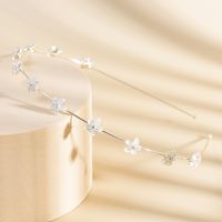 Women's Simple Style Waves Flower Bow Knot Metal Inlay Pearl Zircon Hair Band sku image 1