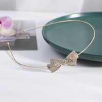Women's Simple Style Waves Flower Bow Knot Metal Inlay Pearl Zircon Hair Band sku image 7