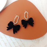 1 Pair Simple Style Bow Knot Flannel Inlay Artificial Diamond Women's Drop Earrings main image 1