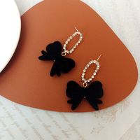 1 Pair Simple Style Bow Knot Flannel Inlay Artificial Diamond Women's Drop Earrings main image 2