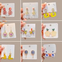 1 Par Moda Forma De Corazón Flor Nudo De Lazo Aleación Enchapado Embutido Diamante Artificial Mujeres Pendientes De Gota main image 1