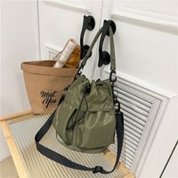 Women's Nylon Solid Color Preppy Style Classic Style Sports Cross Straps Sewing Thread Bucket String Crossbody Bag main image 10