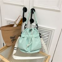 Women's Nylon Solid Color Preppy Style Classic Style Sports Cross Straps Sewing Thread Bucket String Crossbody Bag sku image 6