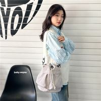 Women's Nylon Solid Color Preppy Style Classic Style Sports Cross Straps Sewing Thread Bucket String Crossbody Bag sku image 7