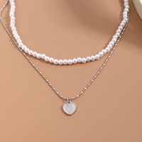 Retro Heart Shape Imitation Pearl Alloy Plating Women's Layered Necklaces main image 5