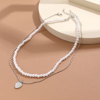 Retro Heart Shape Imitation Pearl Alloy Plating Women's Layered Necklaces main image 4