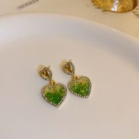 1 Pair Simple Style Heart Shape Bow Knot Patchwork Alloy Drop Earrings main image 2