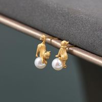 1 Pair Simple Style Cat Inlay Copper Pearl Earrings main image 1